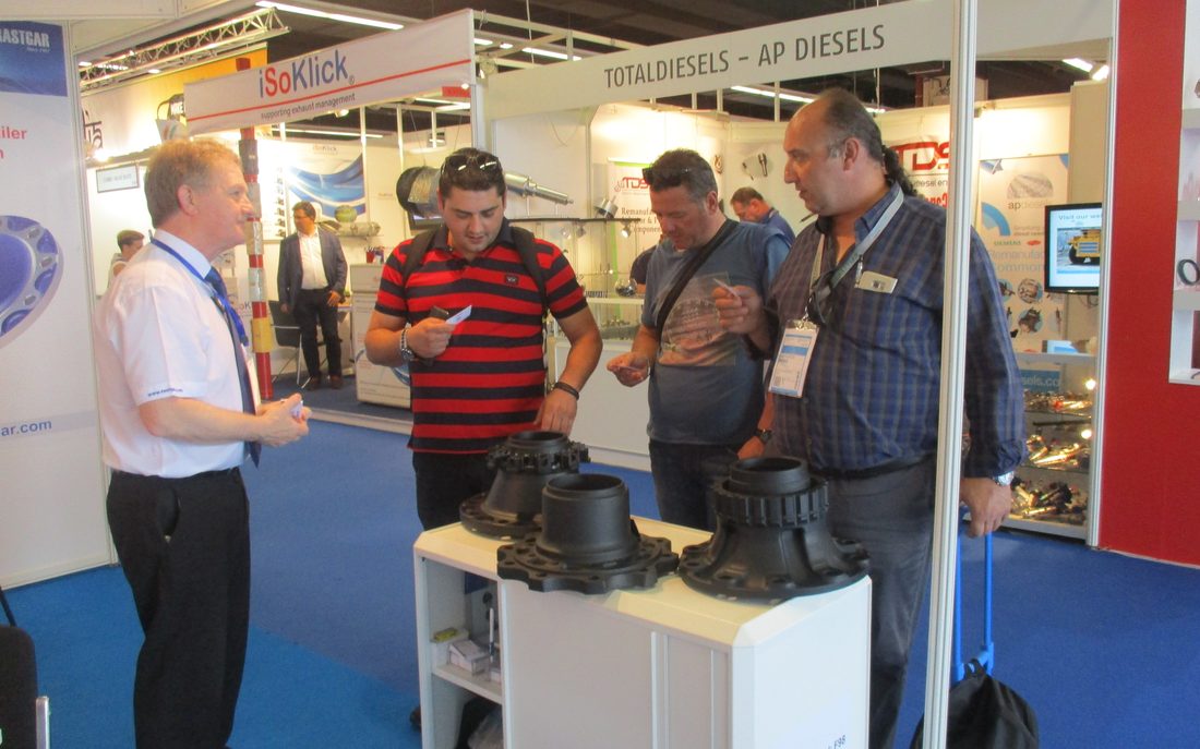 Visitors examining Rastgar wheel hubs at Automechanika Germany 2018, Frankfurt